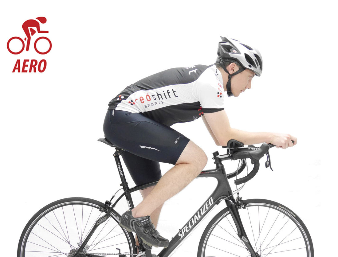 Man riding road bike with aerobars