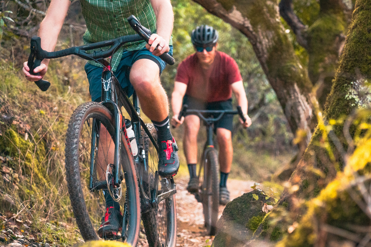 image of gravel bike riders with riser drop bars 